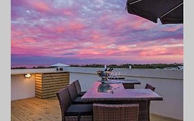 Top-Floor Beachside Apartment With Views
